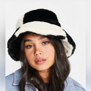 ASOS DESIGN color block roll back bucket hat in black and white